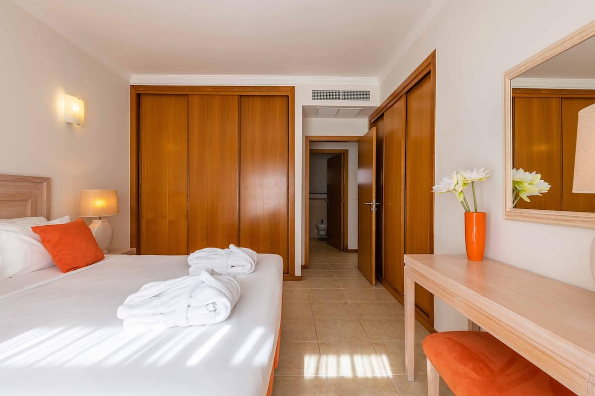 Family Apartment, 1 Bedroom, Garden View | 1 bedroom, in-room safe, desk, blackout curtains