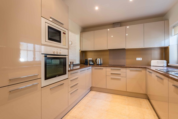 Deluxe Apartment, 2 Bedrooms | Private kitchen | Coffee/tea maker, electric kettle, highchair