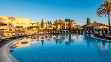 Outdoor pool, open 8:00 AM to 5:00 PM, pool umbrellas, sun loungers