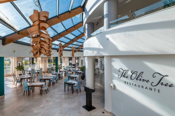 Breakfast, lunch, dinner served; international cuisine, pool views 