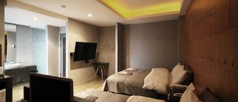 Habitación Deluxe con 2 camas individuales | Ropa de cama de alta calidad, edredón y camas con pillow-top