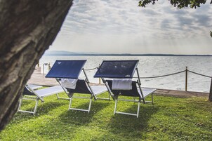 On the beach, sun loungers