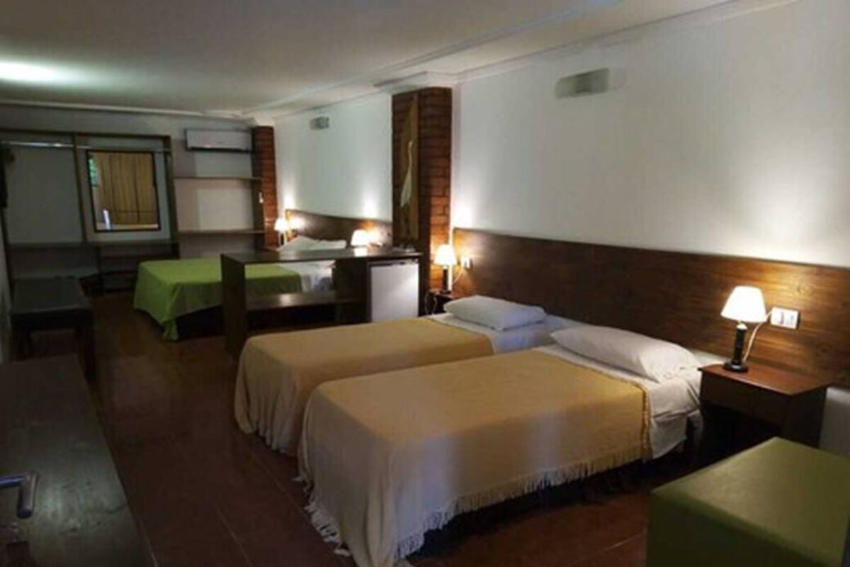 Standard Quadruple Room | Minibar, in-room safe, blackout curtains, free WiFi