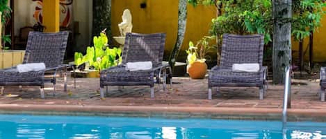 Outdoor pool, open 9 AM to 7 PM, sun loungers