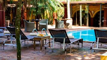 Outdoor pool, open 9 AM to 7 PM, sun loungers