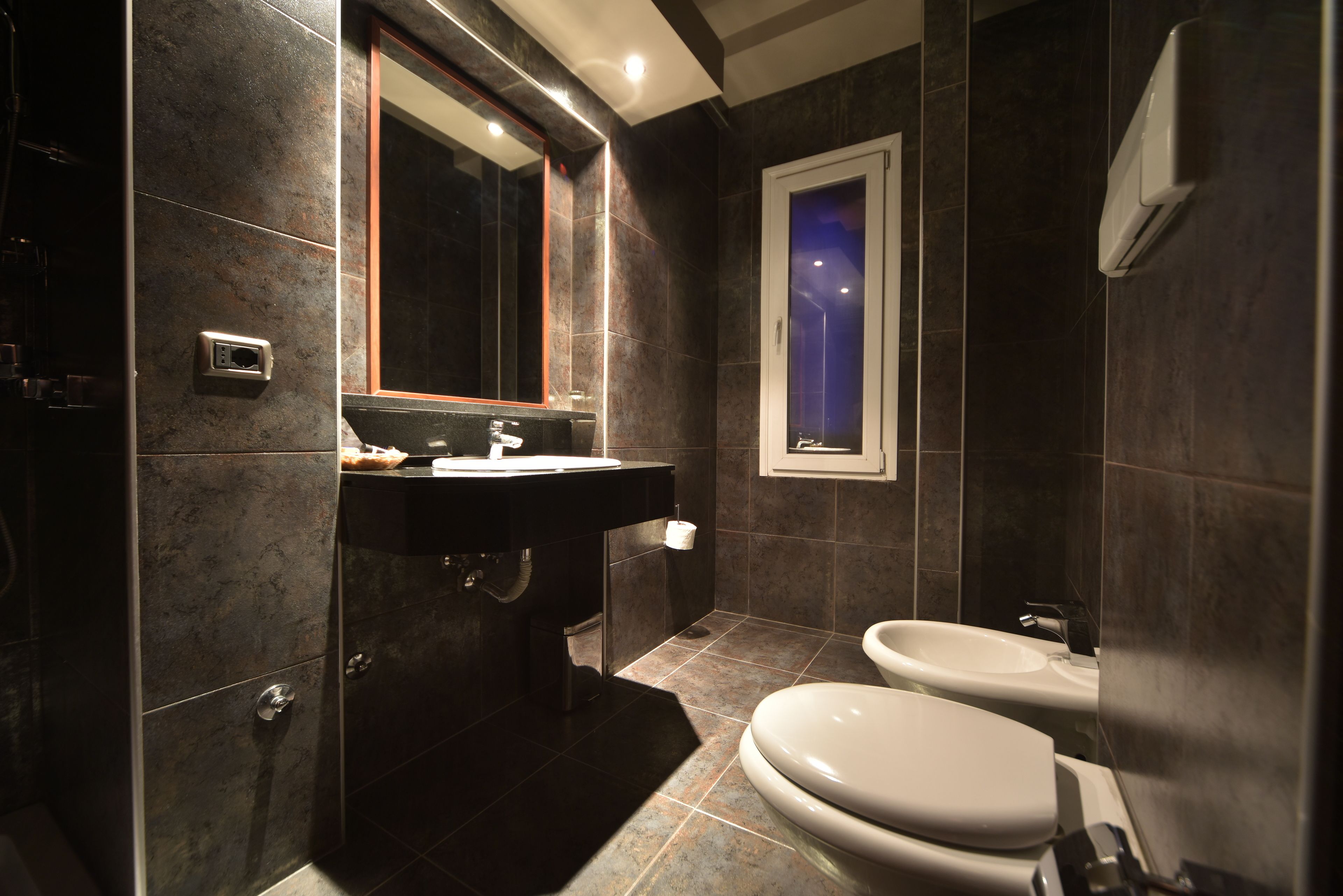 separate bathtub and shower, deep-soaking bathtub, designer toiletries