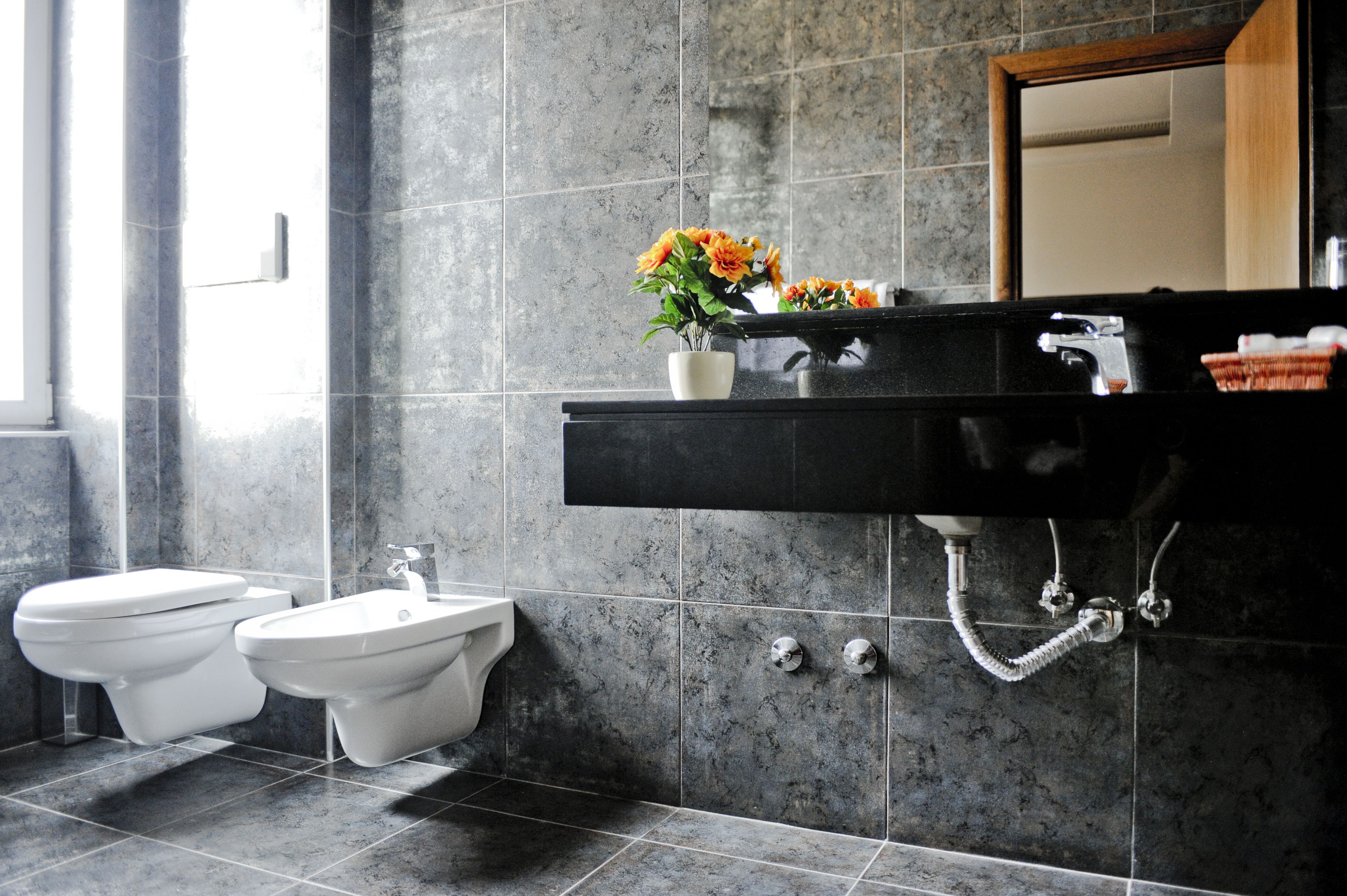 separate bathtub and shower, deep-soaking bathtub, designer toiletries