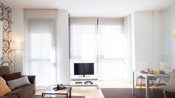 32-inch flat-screen TV with satellite channels, TV, DVD player