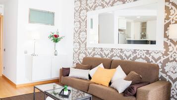 32-inch flat-screen TV with satellite channels, TV, DVD player