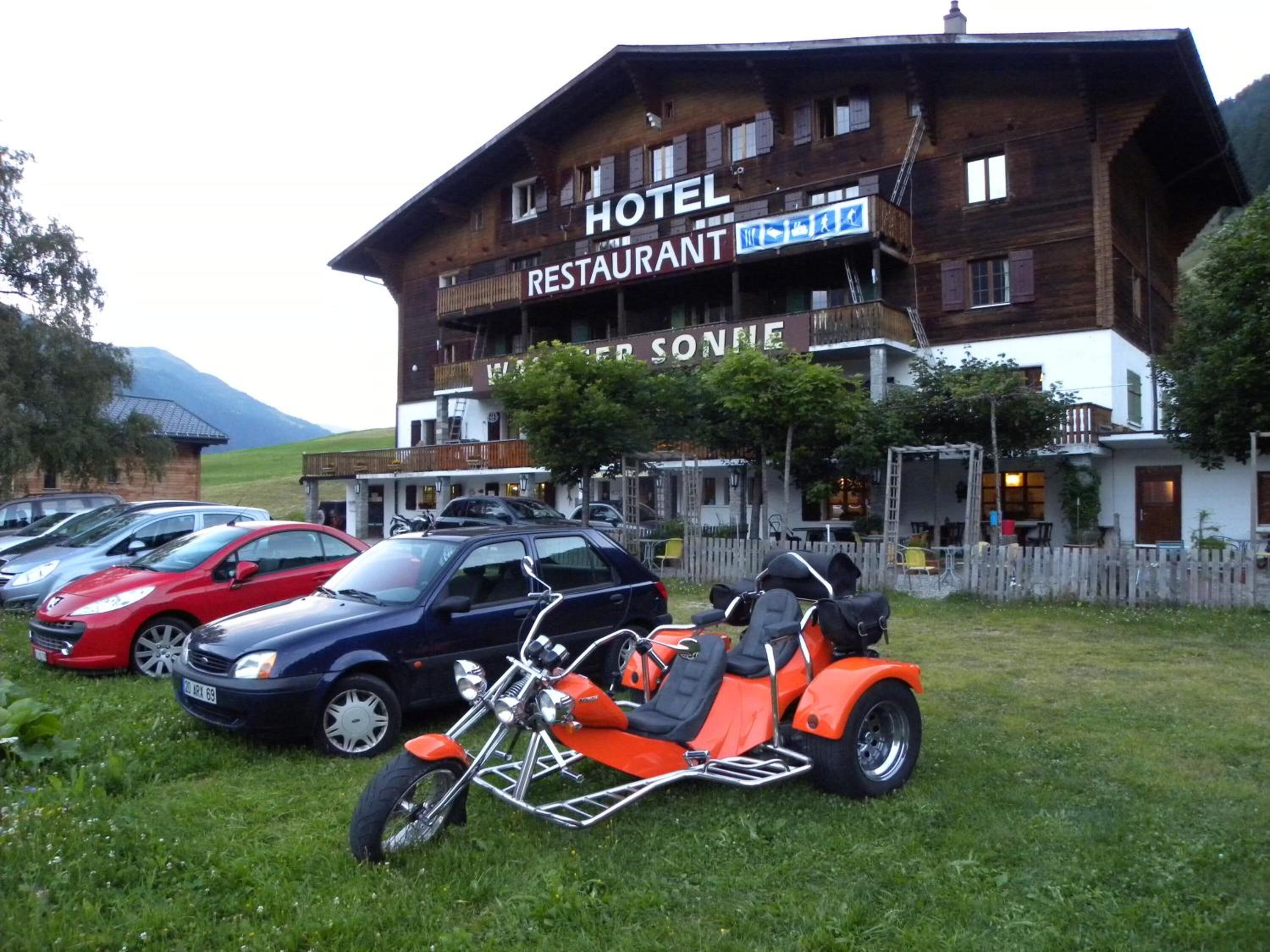 A hotel with a restaurant named "SONNIE" in front.