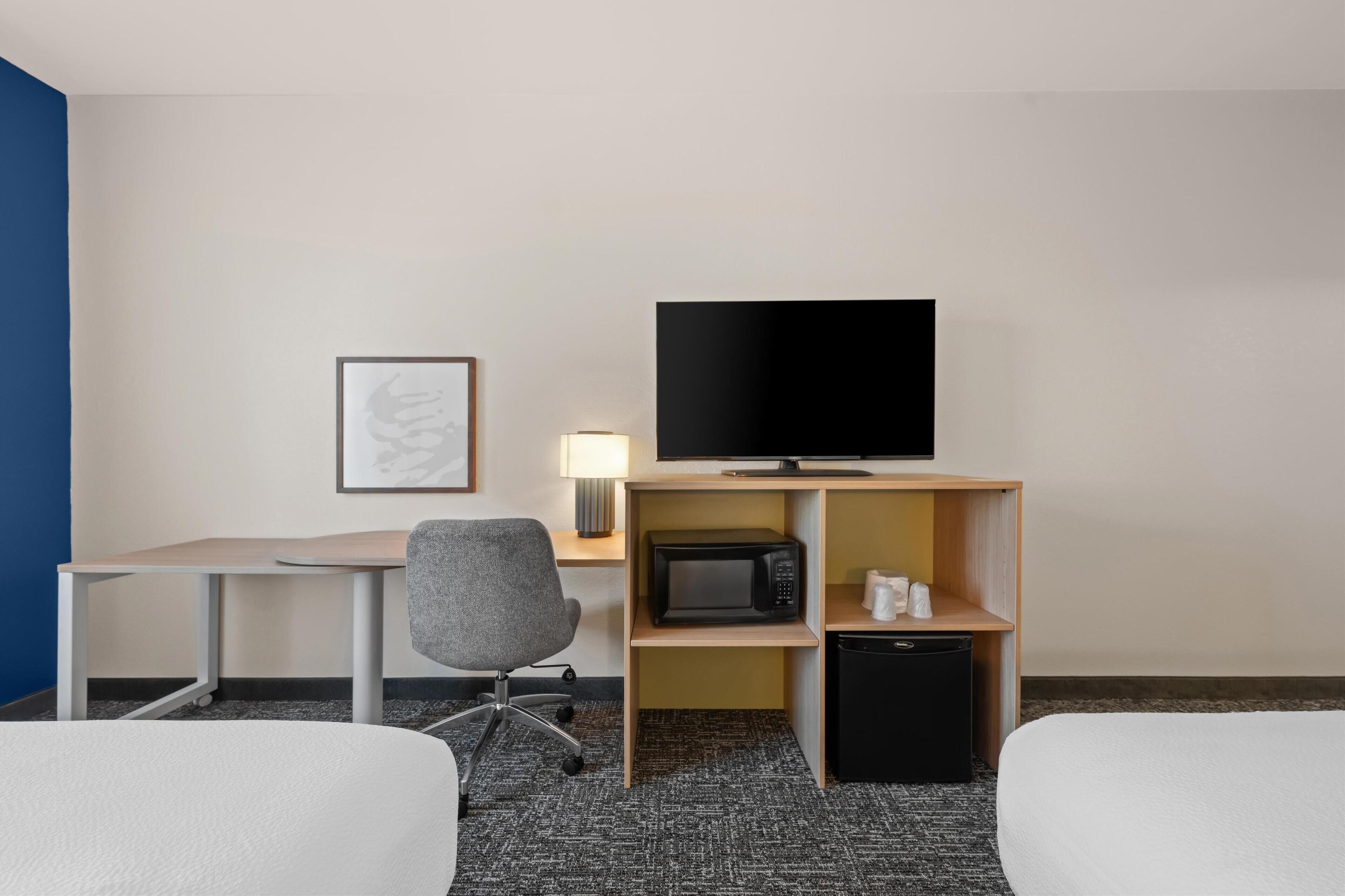 Desk, laptop workspace, blackout curtains, iron/ironing board