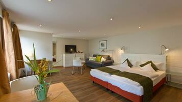 Standard Apartment | Hypo-allergenic bedding, down comforters, in-room safe