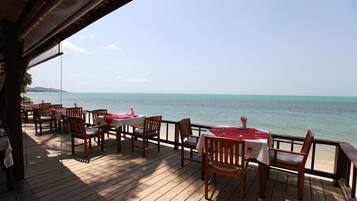 Breakfast, lunch, dinner served; beach views