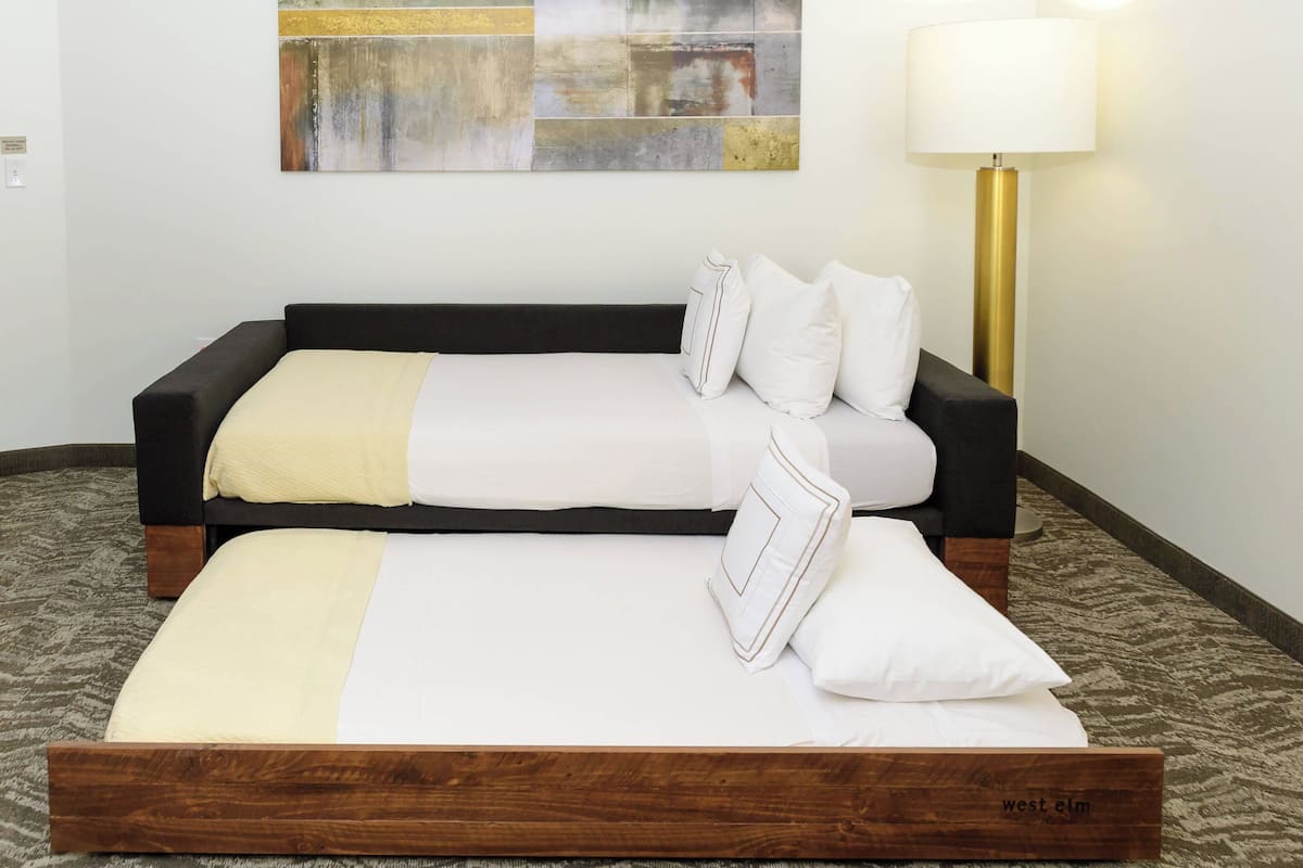 desk, laptop workspace, blackout curtains, iron/ironing board