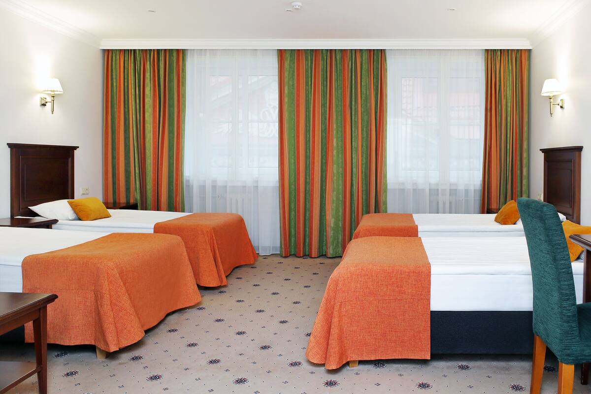 Family Room | 1 bedroom, premium bedding, minibar, in-room safe