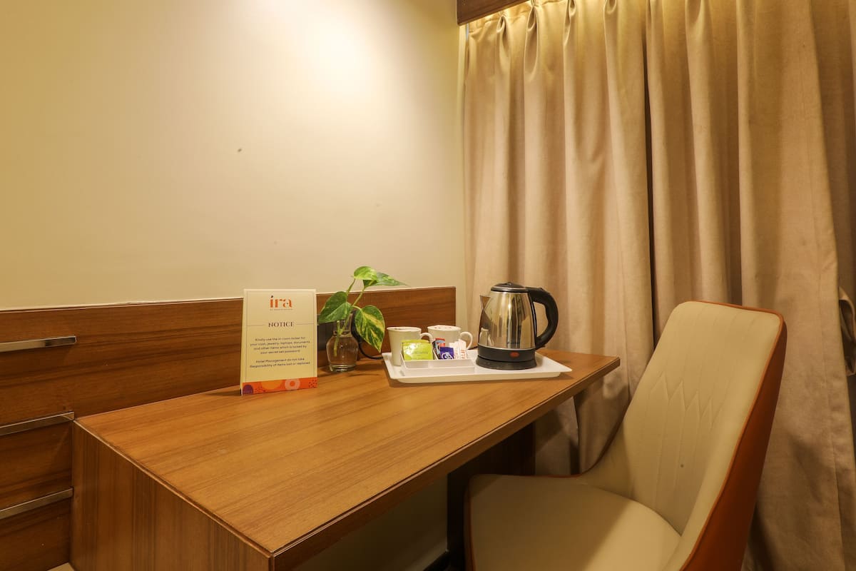 Desk, blackout curtains, soundproofing, iron/ironing board