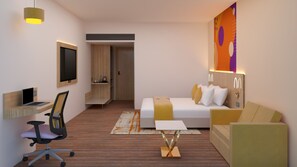 Una habitación de hotel moderna con escritorio, silla, cama y una obra de arte grande en la pared.