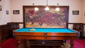A pool table with a mural of a castle and a red carpet. - Pension Brasovu' Vechi (Brasov)