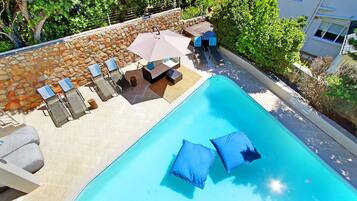 Outdoor pool, pool umbrellas, pool loungers