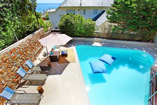 Outdoor pool, pool umbrellas, pool loungers