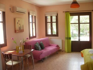 Apartment | Living area | 21-inch flat-screen TV with satellite channels, TV - Gaea Gardens Studios and Villas (Lesvos)