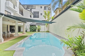 Outdoor pool, pool umbrellas, sun loungers