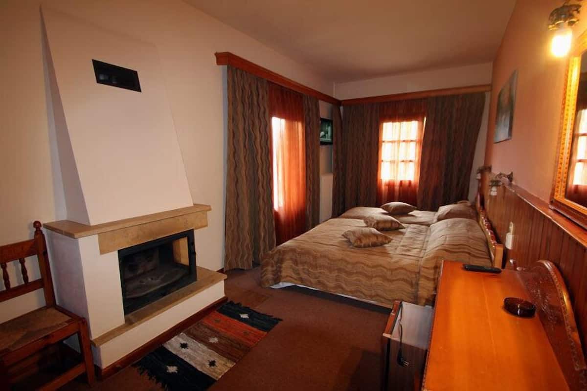 Habitación individual | Caja de seguridad en la habitación, camas extra y wifi gratis