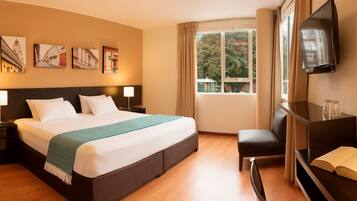Ropa de cama de alta calidad y minibar