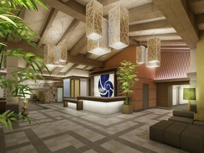 A spacious lobby with a reception desk, hanging geometric light fixtures, and a large abstract wall art piece. - Hotel Indigo Long Island - East End by IHG (Riverhead)