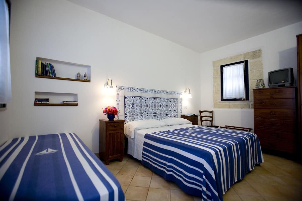 Desk, laptop workspace, free WiFi, bed sheets