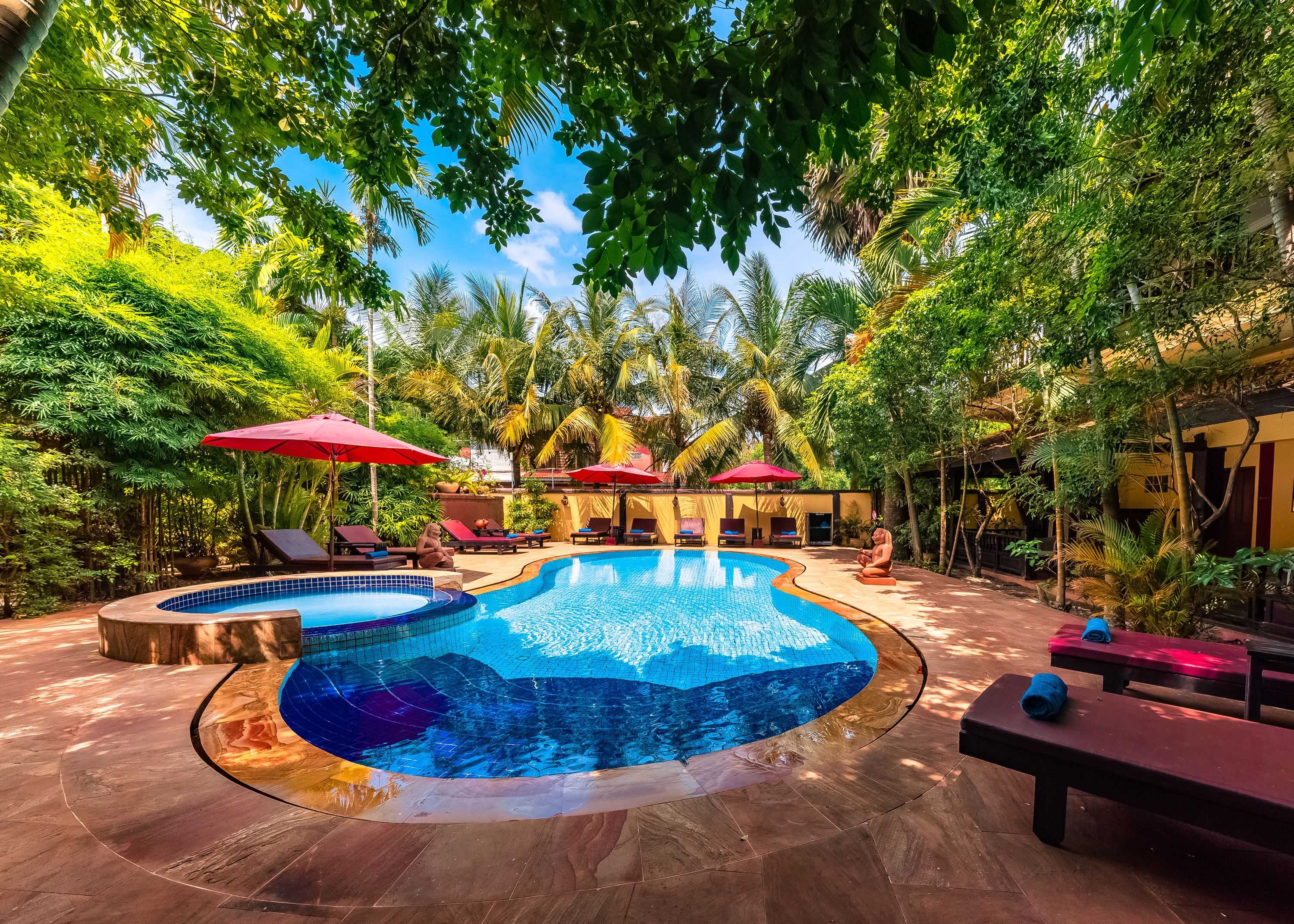 Outdoor pool, open 7 AM to 8 PM, pool umbrellas, pool loungers