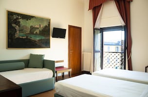 Premium bedding, down comforters, in-room safe, soundproofing