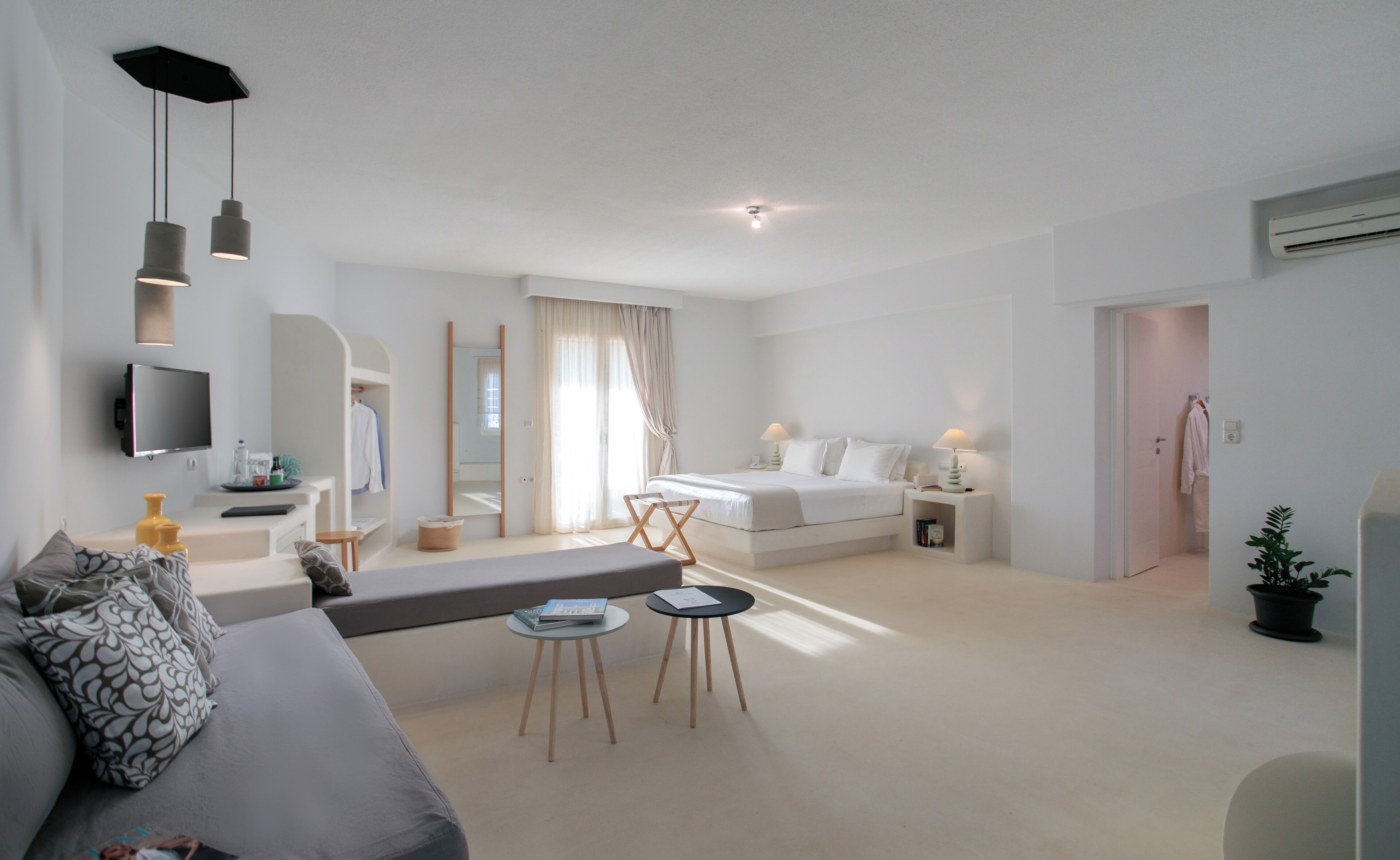 deluxe sea view suite | living area | 26-inch lcd tv with satellite channels, tv