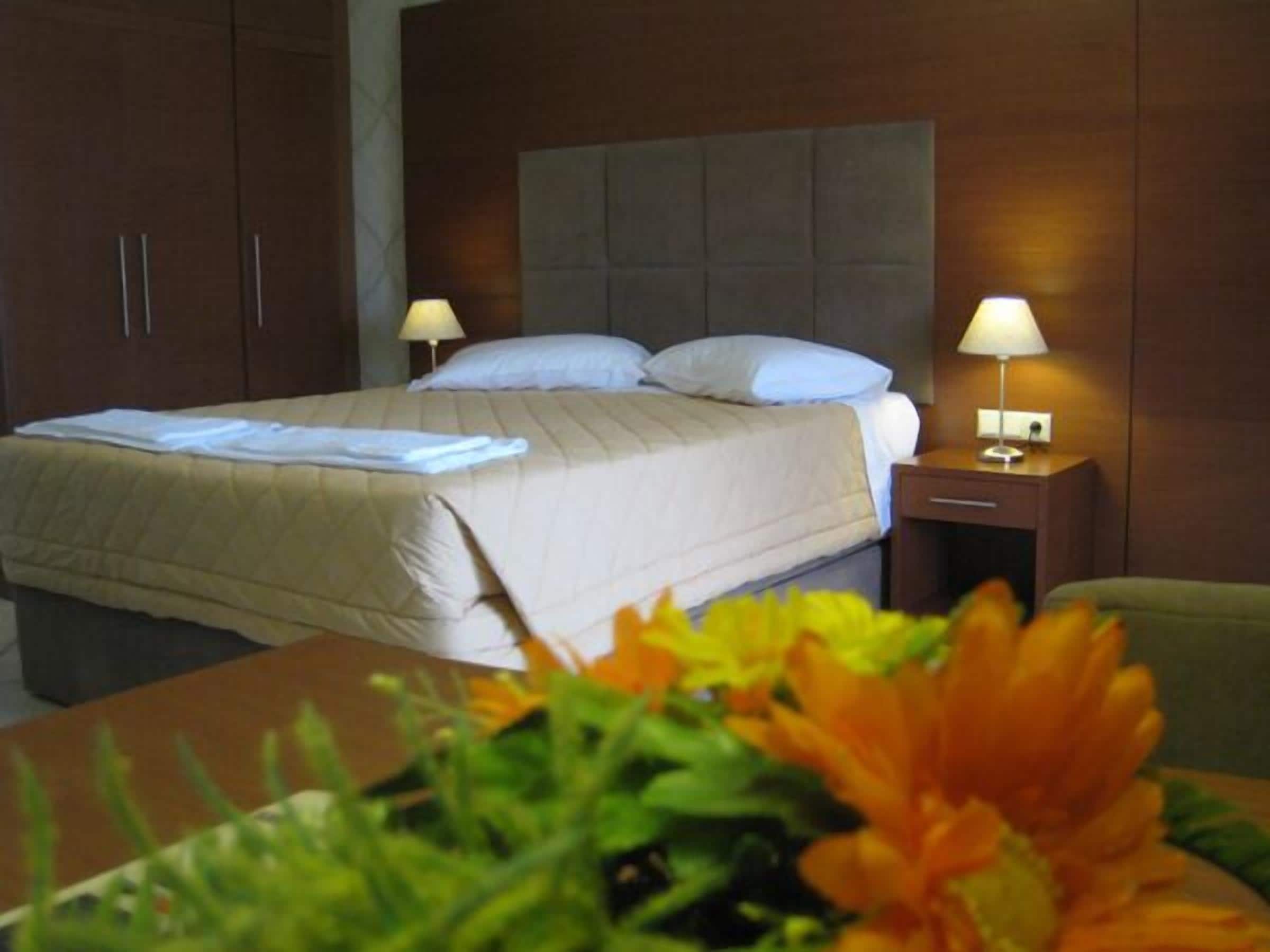 superior double or twin room, pool view | in-room safe, desk, blackout curtains, soundproofing