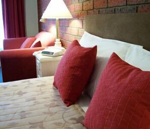 Hypo-allergenic bedding, minibar, desk, iron/ironing board