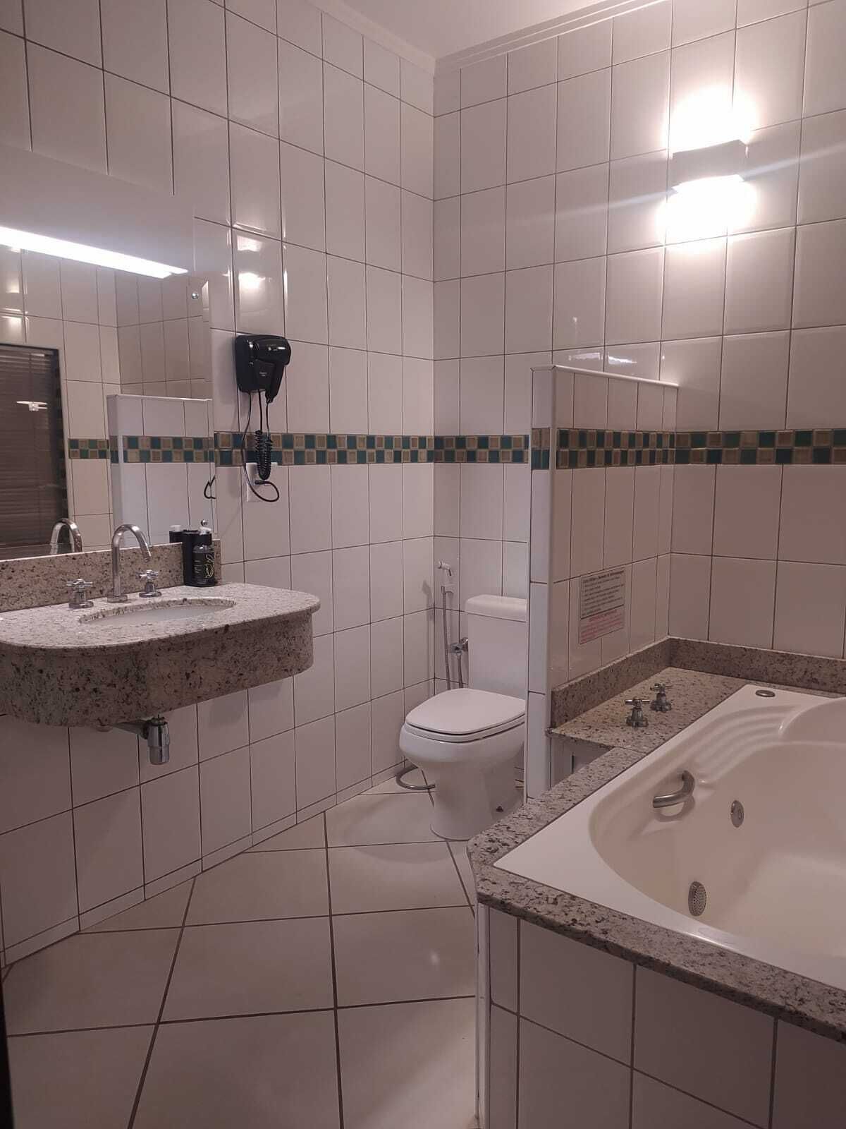 classic suite, 1 double bed | bathroom | shower, free toiletries, towels