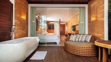 Premium Class Pé na Areia | Een minibar, een kluis op de kamer, een bureau, verduisterende gordijnen