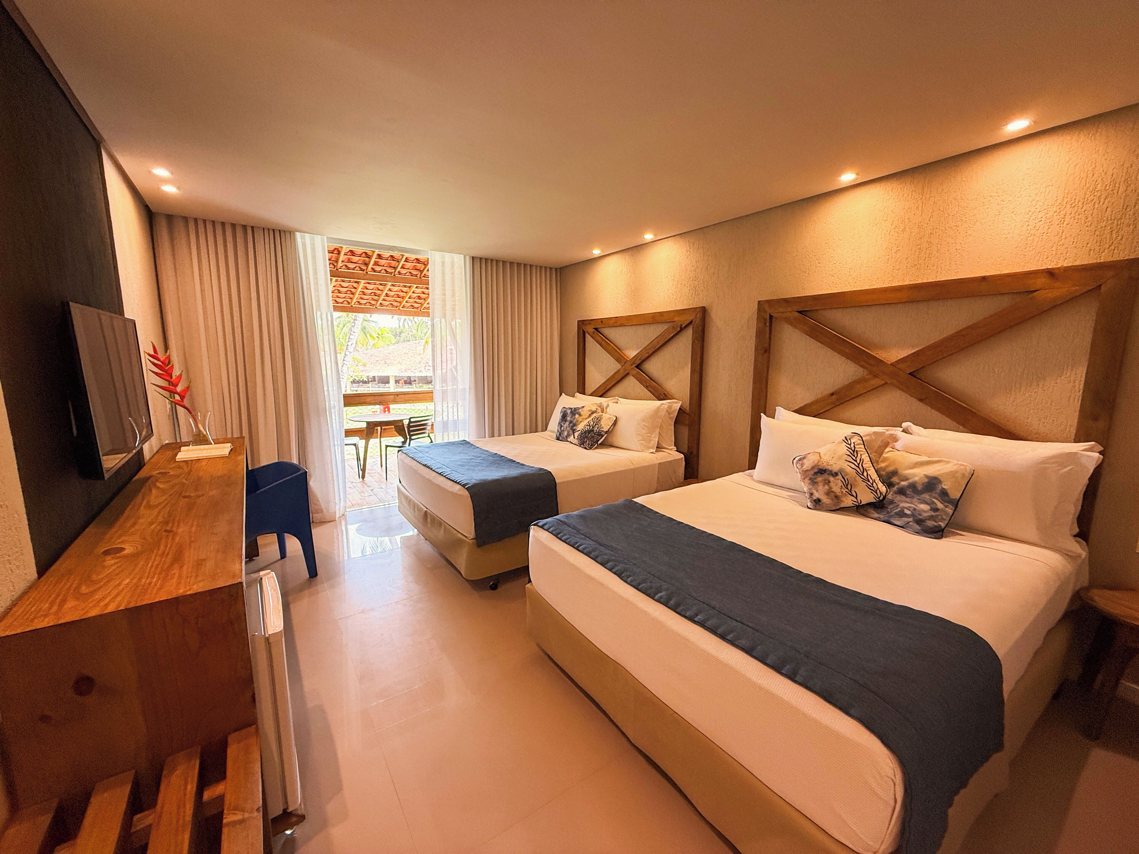 Suíte Família Superior | Frigobar, cofres nos quartos, escrivaninha, cortinas blackout