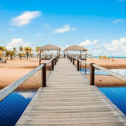 On the beach, sun-loungers, beach umbrellas, beach towels