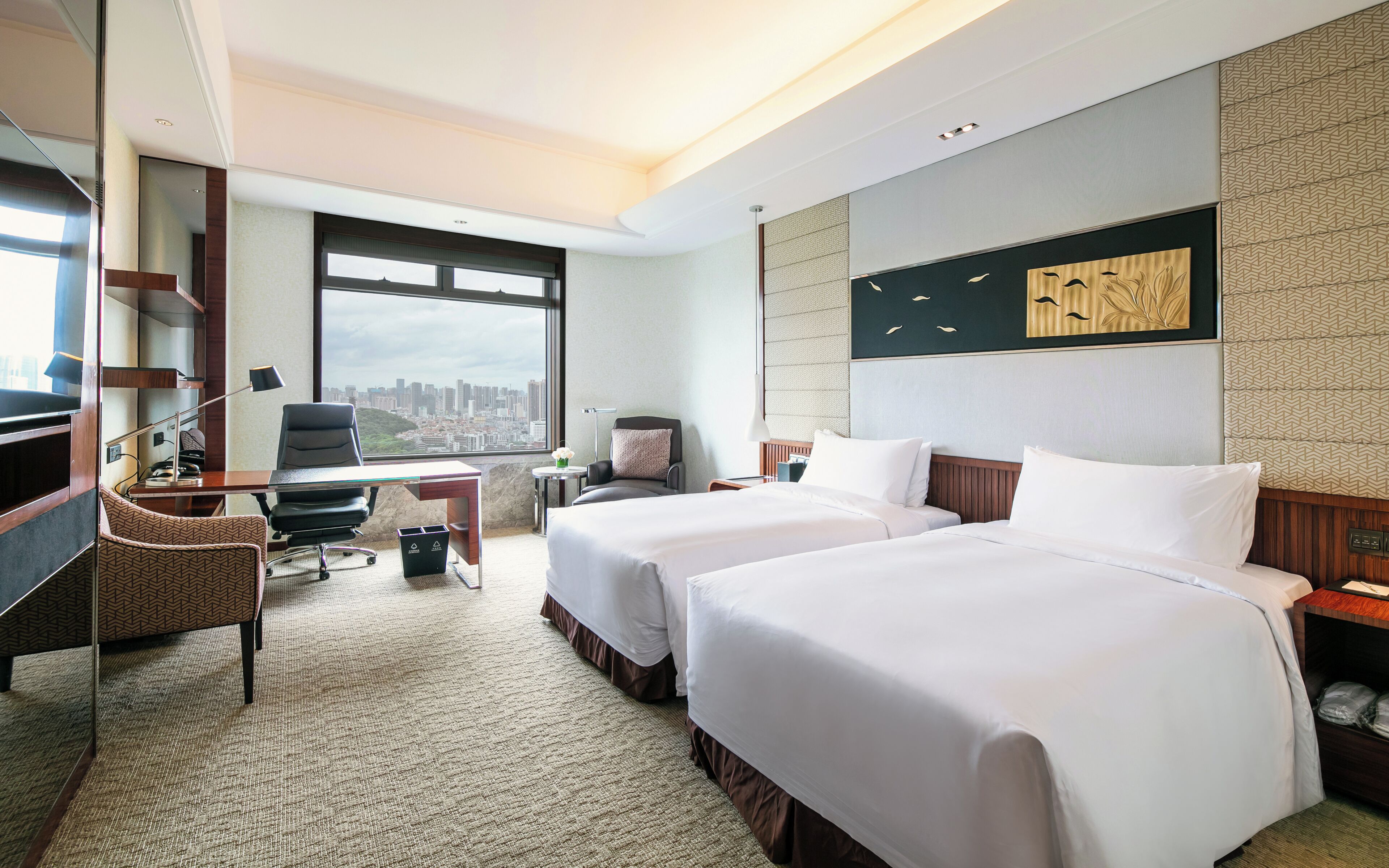 Premium bedding, down comforters, minibar, in-room safe