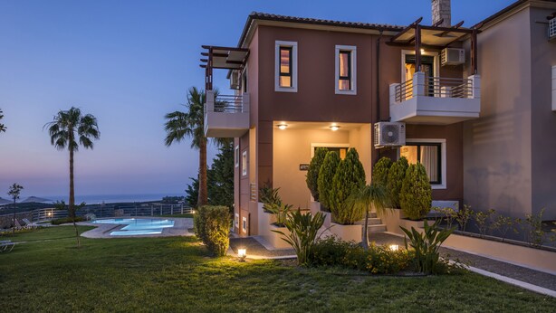 A modern two-story house with a swimming pool, well-maintained garden, and a view of the sea. - Athina Luxury Villas (Platanias)