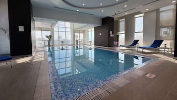 Indoor pool, open 10:00 AM to 10:00 PM, sun loungers
