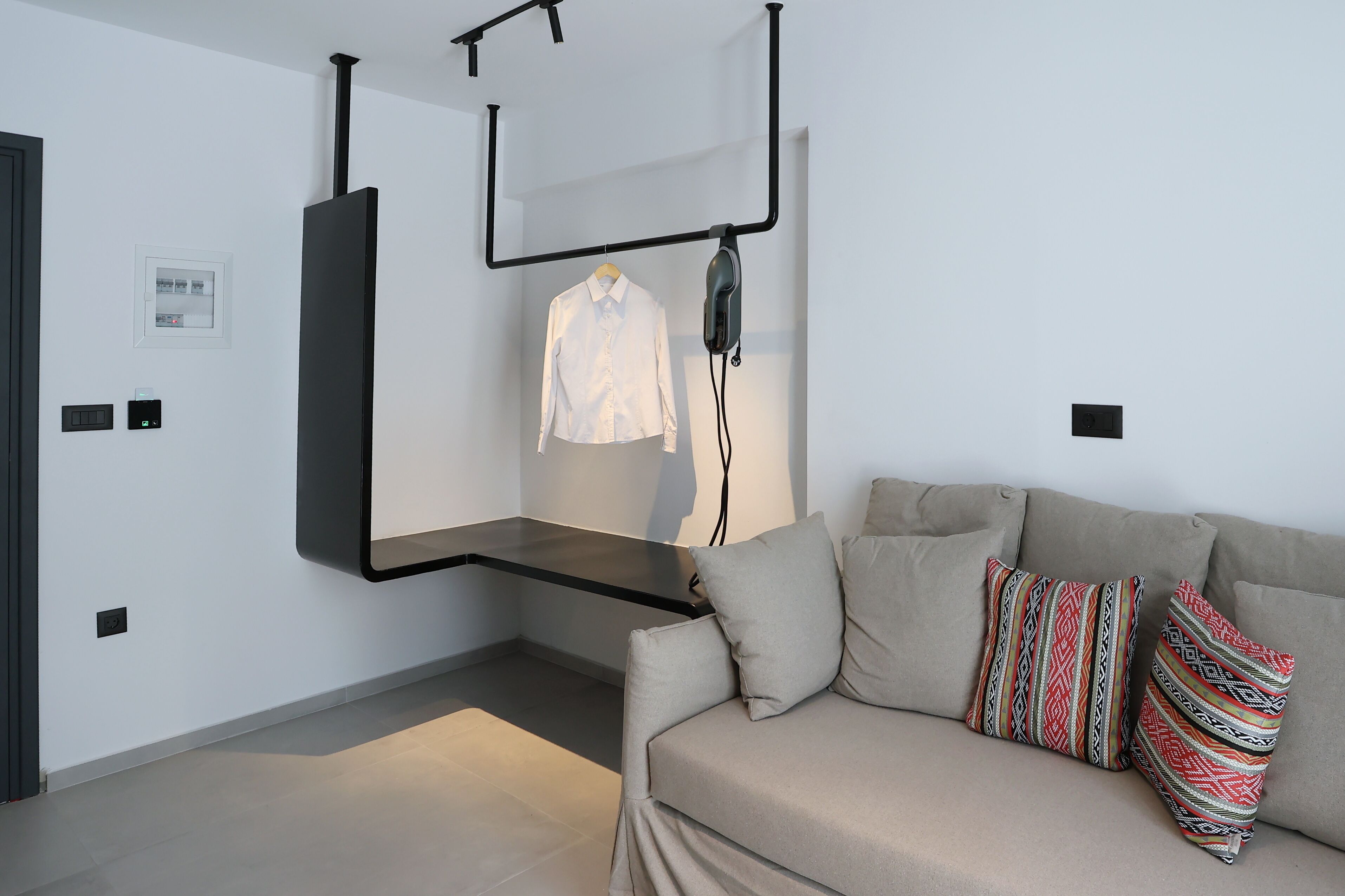 superior suite with pool view | living area | 32-inch tv with cable channels