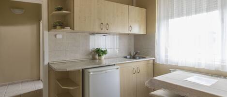 Fridge, microwave, cookware/dishes/utensils