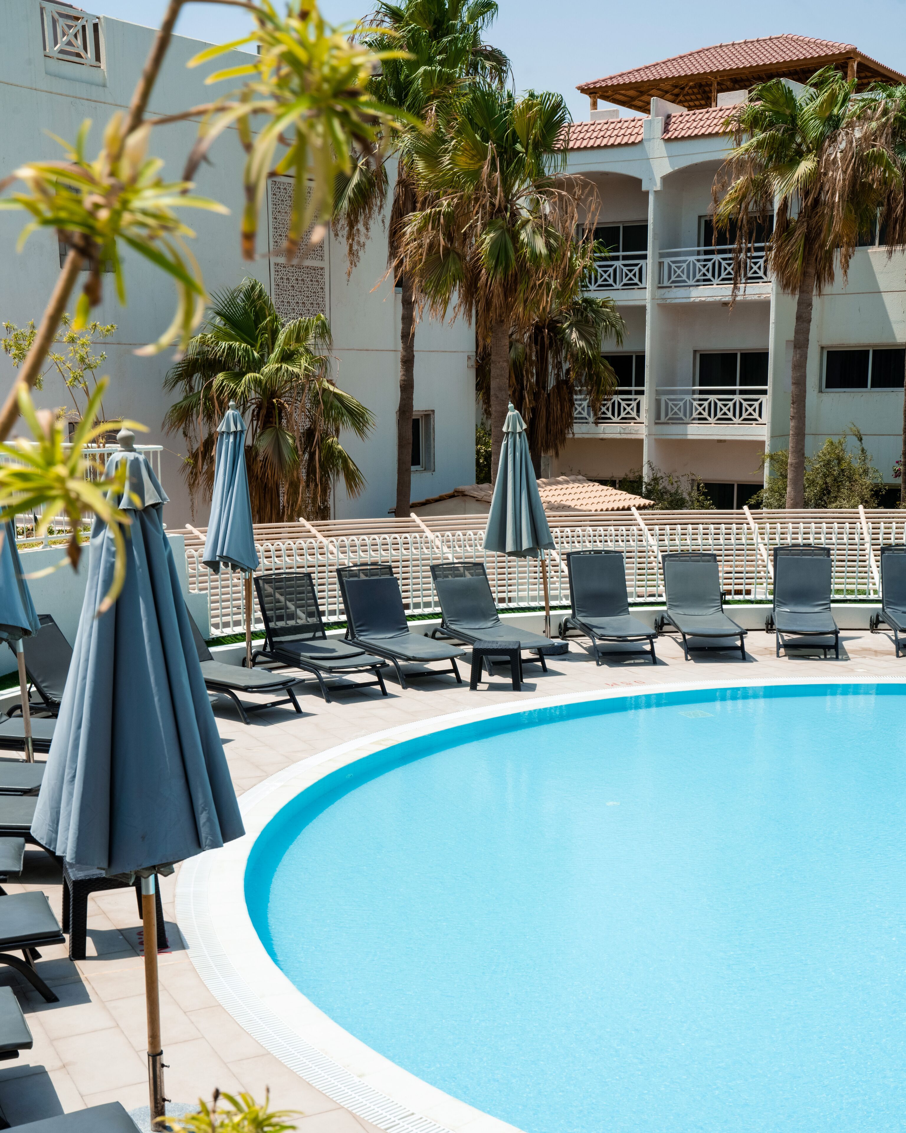 2 outdoor pools, open 7:00 AM to 7:00 PM, pool loungers