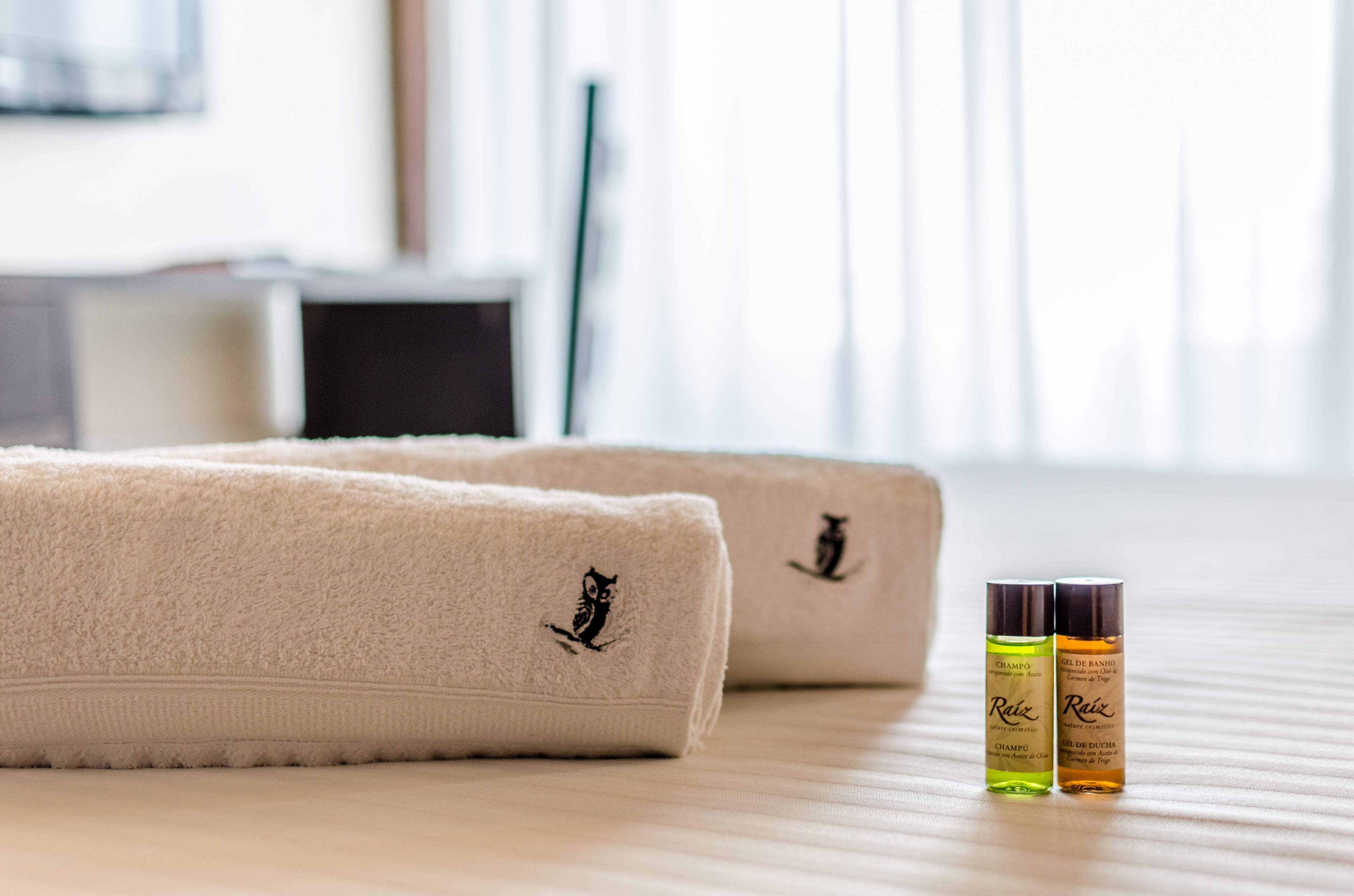 eco-friendly toiletries, hair dryer, towels