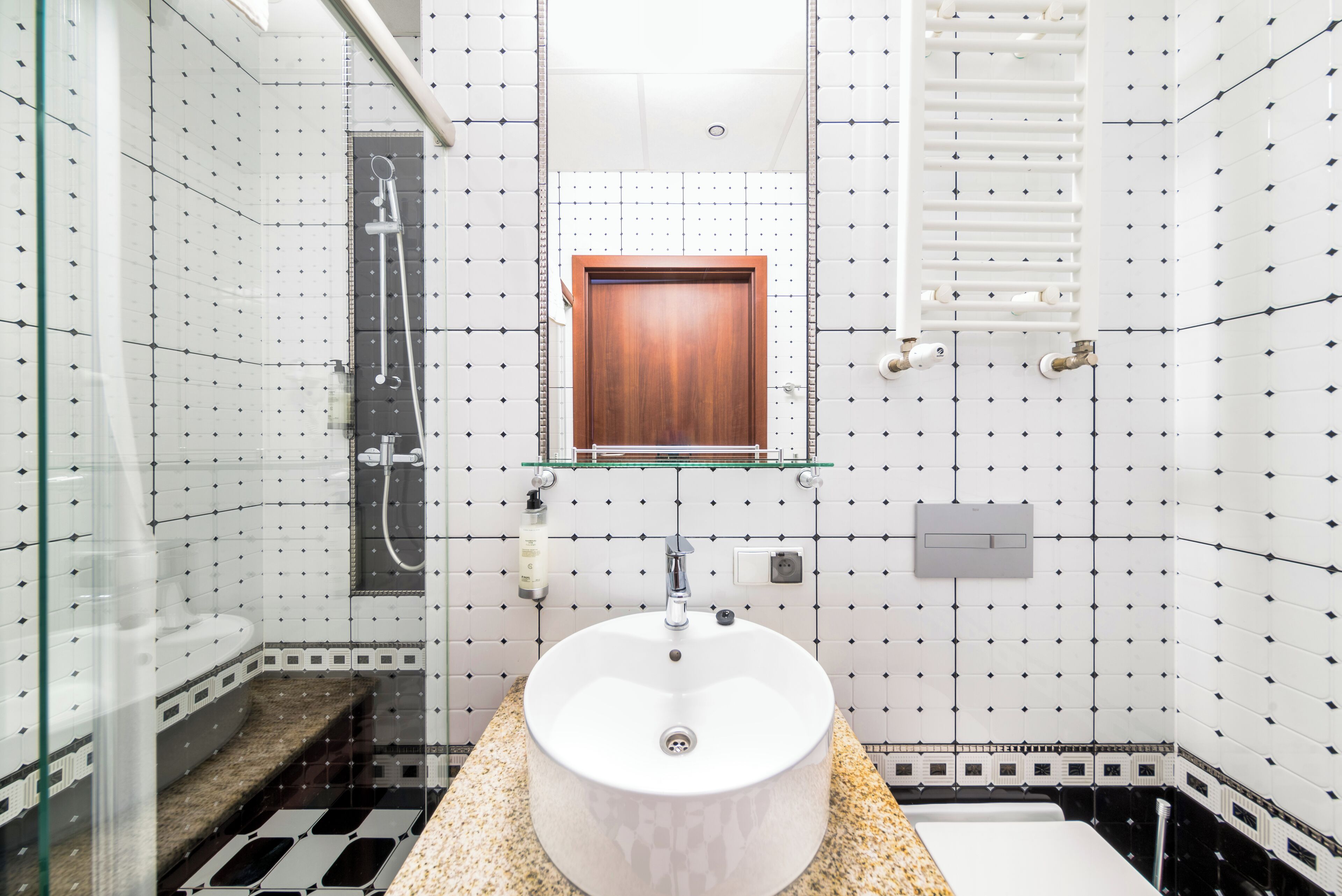 single room | bathroom | shower, hair dryer, towels, soap