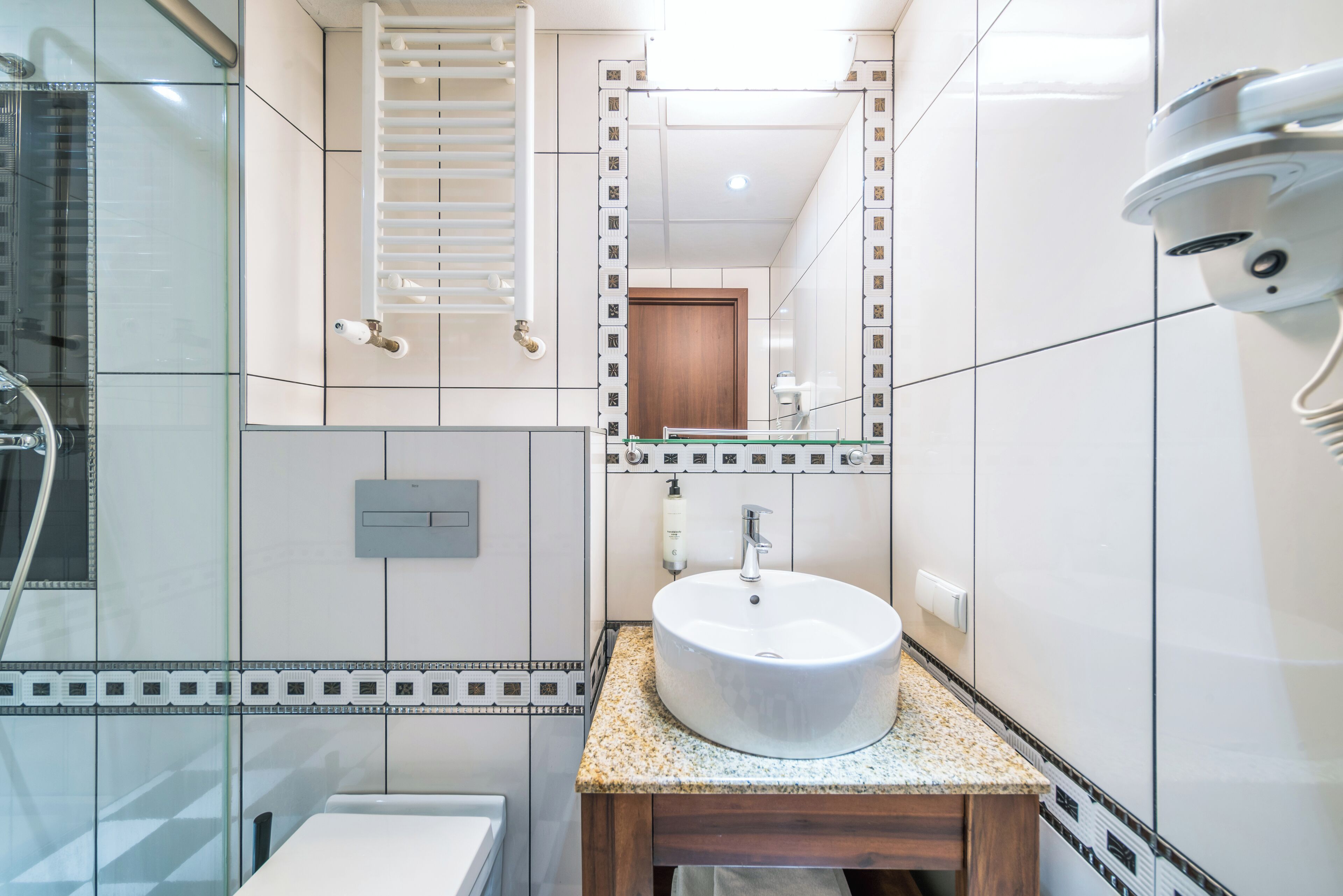 comfort double room, 1 queen bed, city view, tower | bathroom | shower, hair dryer, towels, soap