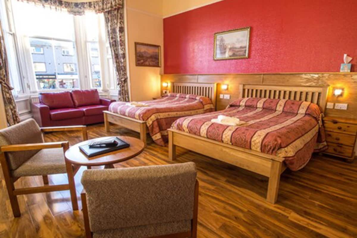 family room | desk, iron/ironing board, travel cot, free wifi