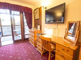 Desk, iron/ironing board, travel cot, free WiFi